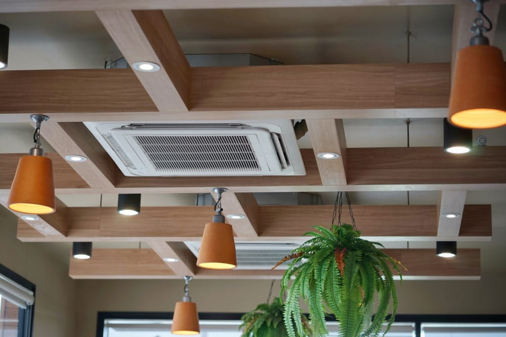 Ducted air con units in modern ceiling